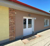 Commercial premises on Cintorínska Street in Rimavská Sobota with brick cladding and a light facade.