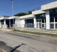 The building on 1. Mája Street in Hurbanovo serves as warehouses and halls.