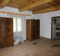 Interior with wooden cabinets and flooring with wood decor in Home Construction.