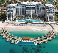 A luxury resort in Paje with unique architecture and private beach pavilions.