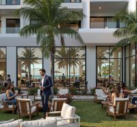 A spacious living area under palm trees with an ocean view in Paje.