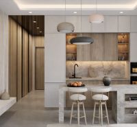 Kitchen in a one-room apartment with a concrete floor and bright lighting.
