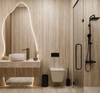 Bathroom with wood-patterned flooring, a sink, and a shower in a studio apartment.