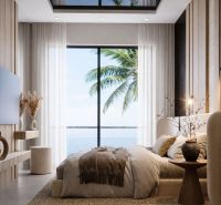 A bright bedroom with a large window, a bed, and decorations in a two-room apartment.