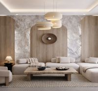 Living room with a sofa, an armchair, and a wooden decor floor in a 2-room apartment.