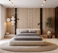 A bedroom with stylish decor, a comfortable bed, and a plant in a 4-room apartment.