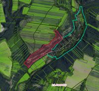 Aerial view of agricultural and forest lands around Domaníky.