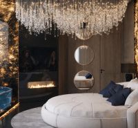 Luxury bedroom in a 5 or more room apartment with a central chandelier and fireplace.