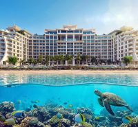 Beachfront hotel in Paje, with a turtle and colorful fish in the foreground.