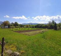 Garden on residential plots on Hlboká Street in Turany with a view of the mountains.