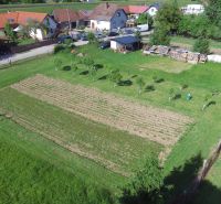 Plots - housing on Hlboká Street in Turany with fruit trees and a garden.