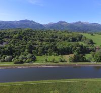 Land near Turany on Hlboká Road suitable for residential plots, with a view of the forests.