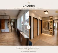 A freshly renovated hallway in a family house with a wooden decor floor.