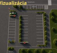 Parking lot on Novozámocká Street in Zvolen, Banská Bystrica Region, Slovakia surrounded by greenery.