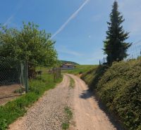 A country road in Lietavská Svinná-Babkov leads to a house, ideal for plots - living.