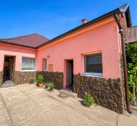 Pink family house on Nova Cesta in Jelka, Galanta district, clad in stone.