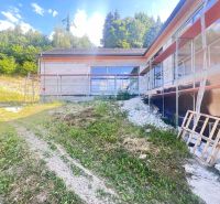 A family house under construction in Badín in the Banská Bystrica district, surrounded by nature.