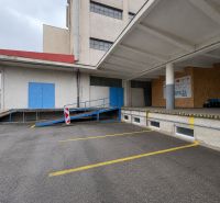 Exterior of the building in Zlatý Potok, Zvolen with a ramp in the area of warehouses and halls.