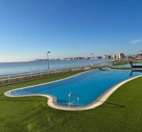 Recreational apartment in La Manga del Mar Menor, Spain, with a pool by the sea.