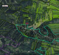 Aerial view of agricultural and forest lands around the town of Vrútky.