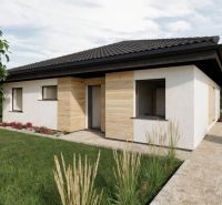 Family house on Kostolná in Drahová with a white facade and wooden decor.