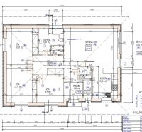 Ground floor layout of a family house with rooms, kitchen, and terrace.