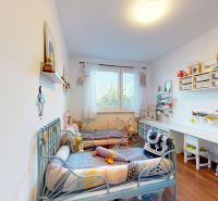 Children's room with two beds, a desk, and decorations, 3-room apartment.