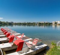 Paddleboards on the shore of the lake in Bratislava-Petržalka on Vígľašská Street.