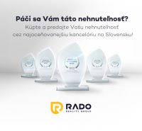 The image shows awards for the real estate agency RADO Reality Group.