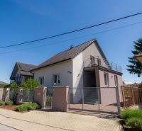 A family house on Jahodova Street in Trenčín with access through a gate and fencing.