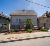 A family house on Jahodova Street in Trenčín with a landscaped front garden and a gate.