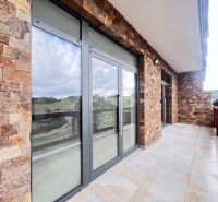 Stone terrace with glass doors in commercial premises in Donovaly, Banská Bystrica district.