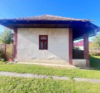 A family house in Žirany, Nitra district, Nitra region, Slovakia, surrounded by a green lawn.