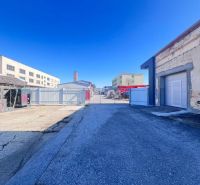 Production premises on Majerská cesta in Majer, Banská Bystrica, capture an empty concrete yard.