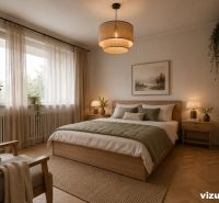 Bedroom with a comfortable bed, armchair, and wooden decor flooring in a 3-room apartment.