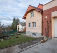 A family house on Borinská Street in Marianka with a front garden and a garage.