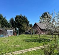 Garden with lawn and trees in Bratislava - Vrakuňa on Hrušovská Street. Plots - residential.