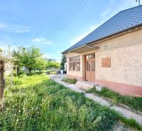A family house in Šoporňa with a large garden and an entrance veranda.