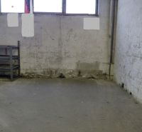 The space of a worn-out hall with a wall, a shelf, and a window in Warehouses and Halls.