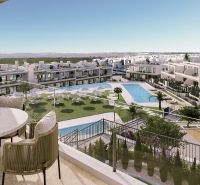 View from the balcony of a 2-bedroom apartment in Torrevieja, pool and outdoor loungers.