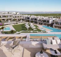 Luxury residential complex in Torrevieja with pools, garden, and lagoon views.