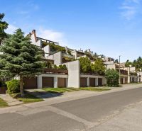 A terraced family house on Talichova Street in Bratislava - Dúbravka surrounded by greenery.