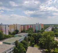 Bratislava-Petržalka, Lachova: Colorful apartment buildings surrounded by greenery and urban environment.