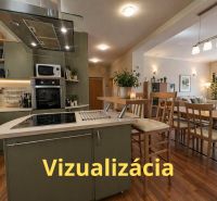 Open kitchen and living room with wood-patterned flooring in a 4-room apartment.