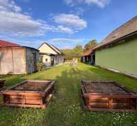 A garden at a family house in Krmeš, Liptovský Mikuláš with raised beds.