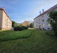 Buildings and park area on Golianova Street in Banská Bystrica, suitable for a 2-room apartment.