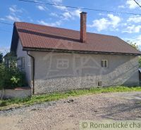 A family house in Šumiac with a simple facade and a sloped roof.