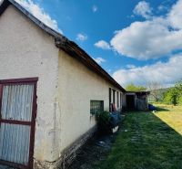 Family house in Pažiť with an extension, garden, sunny weather.