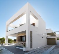 Two-story 2-bedroom apartment in Pulpí with minimalist design and a garden.