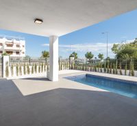 Terrace of a 2-bedroom apartment in Pulpí with a pool and a view.